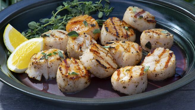 Symon's Dinners Cooking Out season 3 episode 7 on Discovery Plus