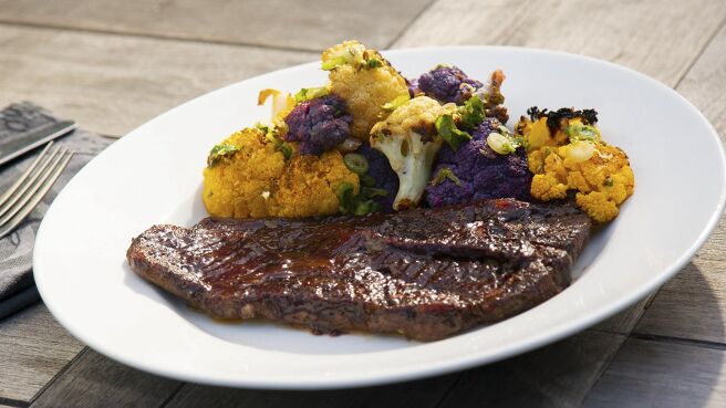 Symon's Dinners Cooking Out season 3 episode 6 on Discovery Plus